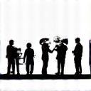 Icon representing on-set management with film crew silhouettes